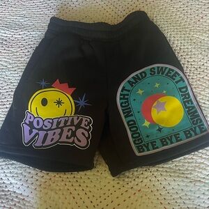 Cool and fun boys Nova black knit shorts with awesome designs- size 10-12.